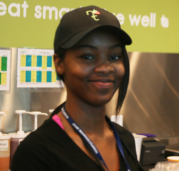 CC Holdings | Nature's Table smiling staff offering healthy, fast casual food